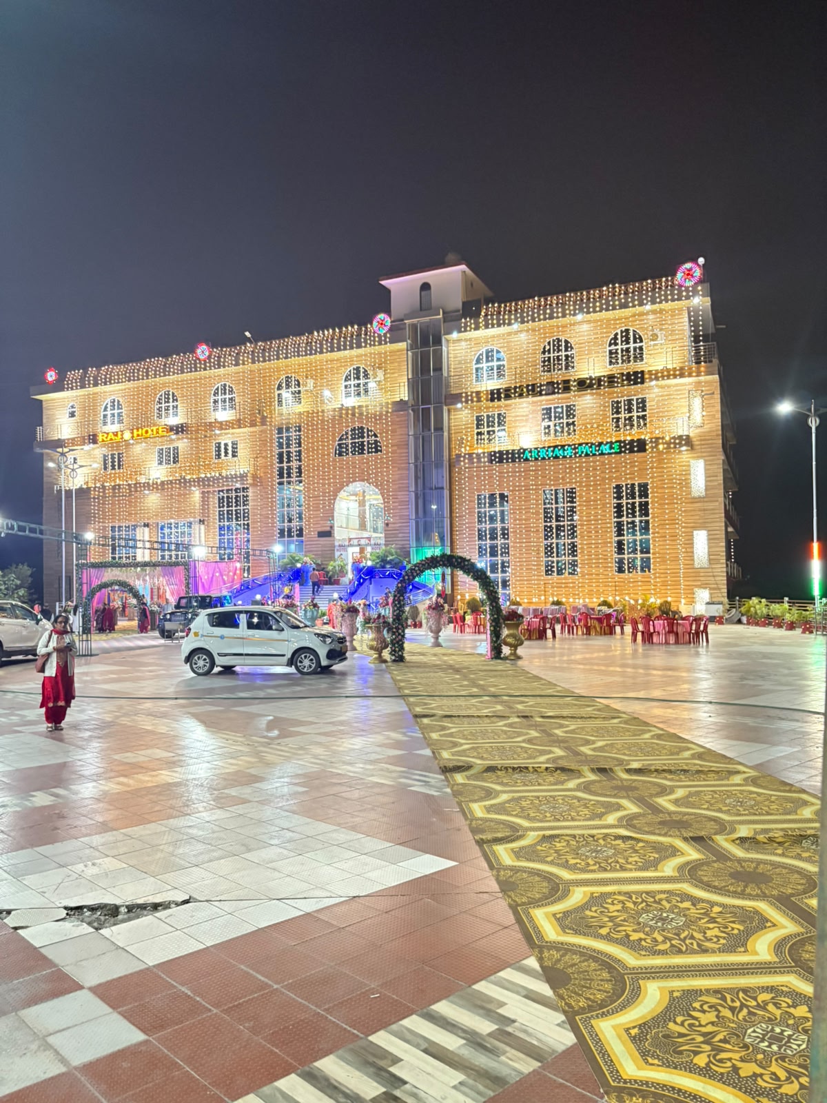 Raj Hotel exterior at night